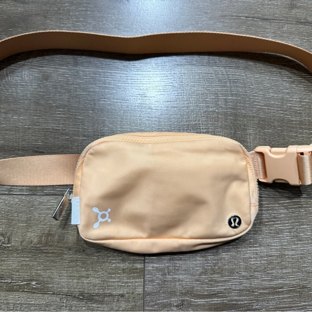 lululemon athletica x Orangetheory Peach Belt Bag - Picture 1 of 2